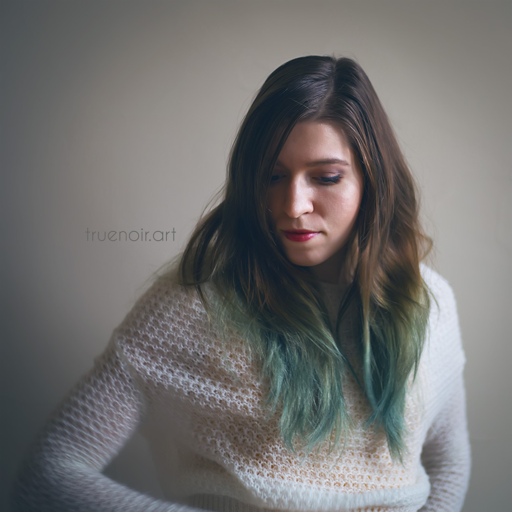 My journey in a picture. Green hair, thoughtful look, and dramatic light.