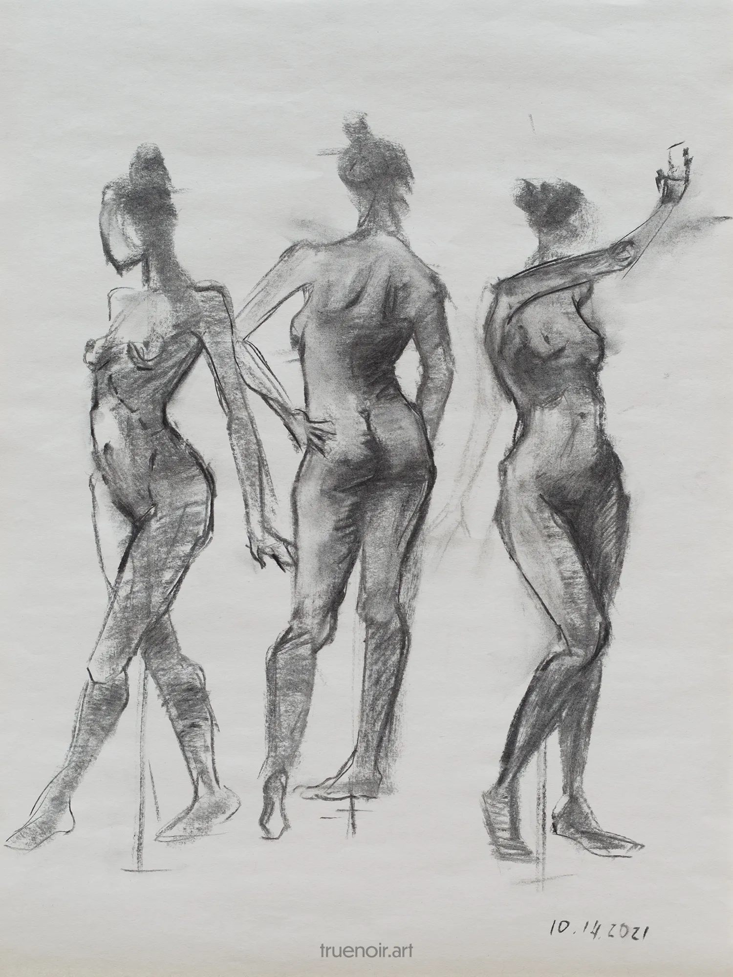 Charcoal drawing on gray paper. There are three female standing figures in this drawing. Each one is drawn from different angles, from a side facing to the left, from the back, and from the side facing to the right.
